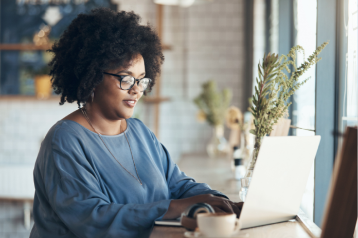 Woman Checking Her Earnings on The Aweber Affiliate Program