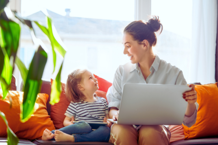 Daughter and Mom on Laptop Showcasing Passive Income for Stay at Home Moms