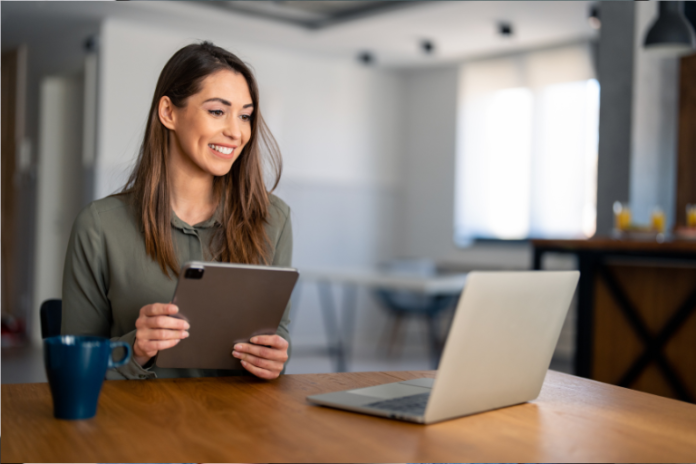 Woman Happy Viewing Her Earning from pay per click affiliate marketing programs